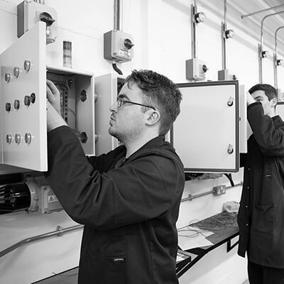 Product Design & Development Technician apprentices working on Electrical Installation and Motor Control