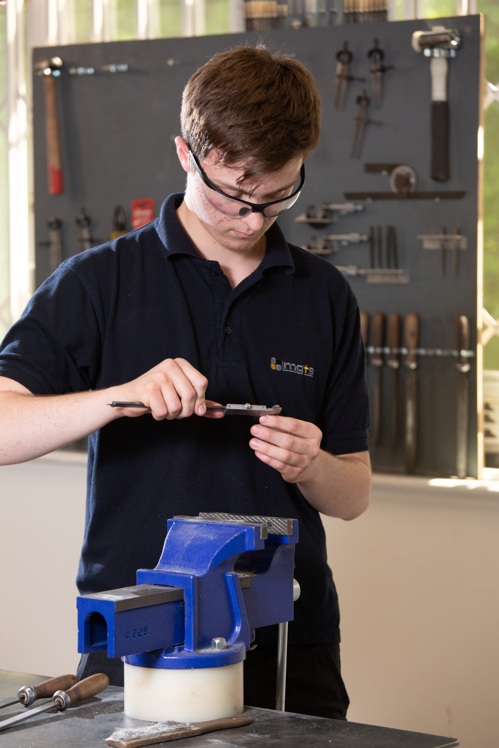 Engineering apprentice had filing part